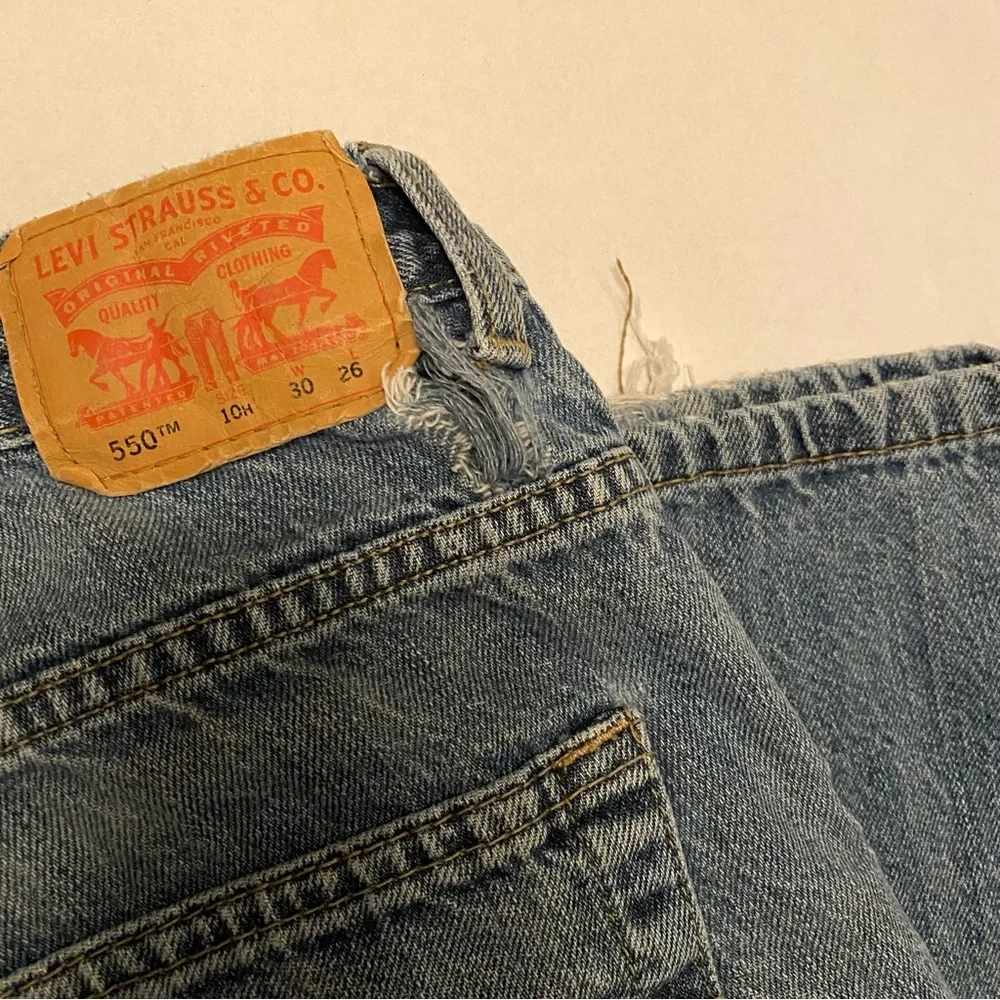 Levi’s 550 red tab blue jeans size 10 husky, 30 inch waist 25 inch inseam.